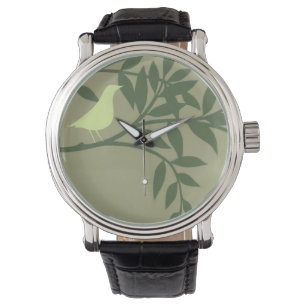 Montre Oiseau vert été perché sur la branche verte
