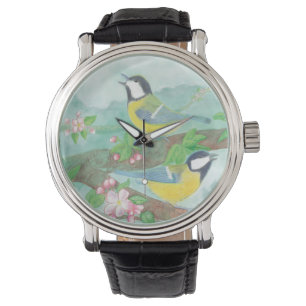 Montre Oiseaux chantant sur une branche d'arbre en fleurs