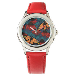 Montre Papillon monarque sur des fleurs rouges