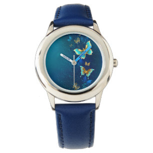 Montre Papillons d'or sur un Arrière - plan bleu