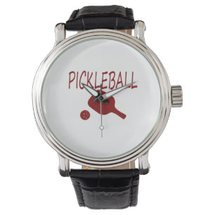 Montre pickleball avec pagaie et boule rouge
