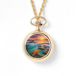 Montre Starfish sur la plage à Dawn