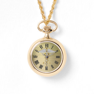 Montre symbole or médical caducée