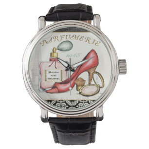 Montre Une chaussure rouge, une bouteille de parfum, et