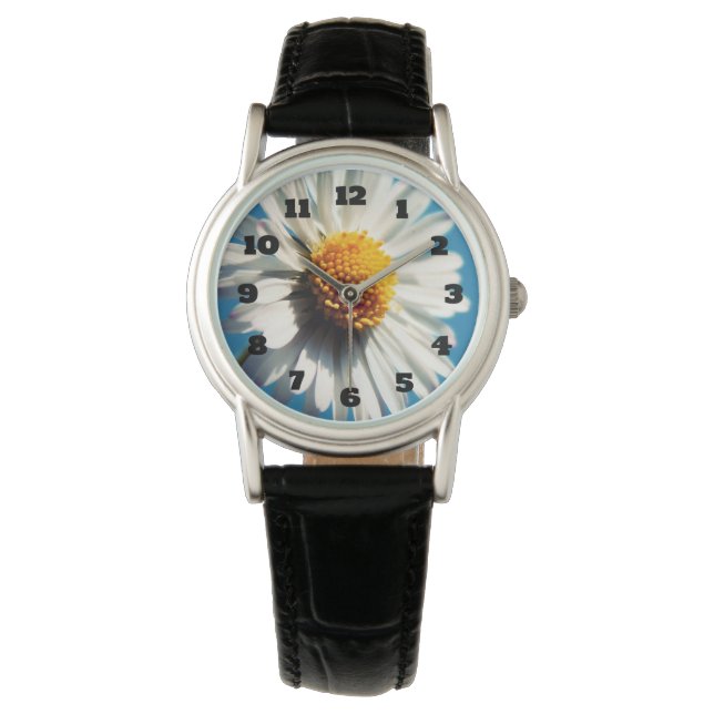 Montre Une pâtisserie blanche sous un ciel bleu (devant)