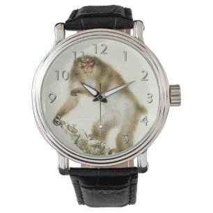 Montre Vieux singe avec cerise en automne