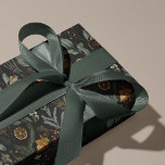 Moody Winter Botanical Christmas Wrapping Paper<br><div class="desc">Add a sophisticated touch to your holiday gifts with this botanical Christmas wrapping paper by Redwood & Vine Design Co. Featuring a dark background with festive greenery, pinecones, dried oranges, and berries, this elegant design blends rustic charm with modern style. Perfect for wrapping Christmas presents, corporate holiday gifts, or seasonal...</div>