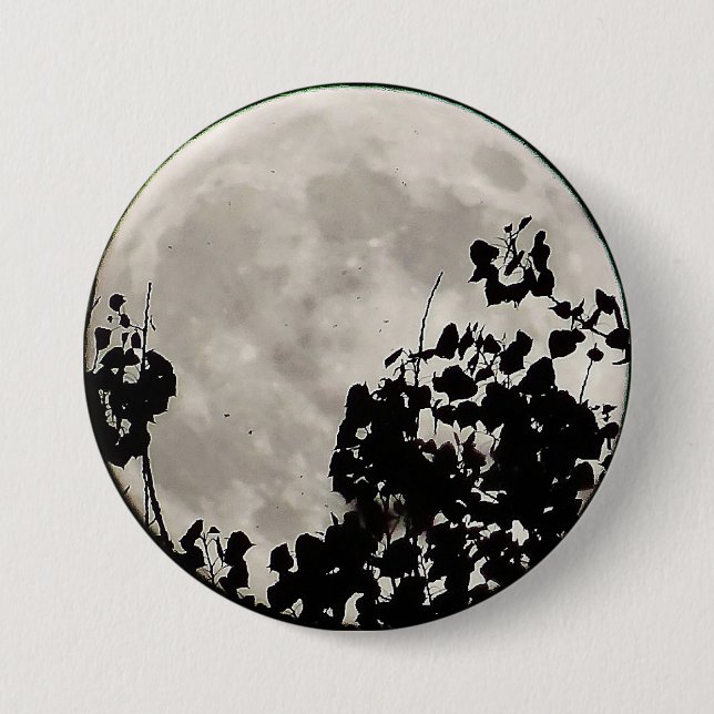 Moon behind dark leaves 3 inch round button (Front)
