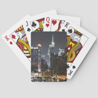 Moon rises over midtown New York. Playing Cards