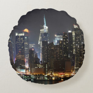 Moon rises over midtown New York. Round Pillow