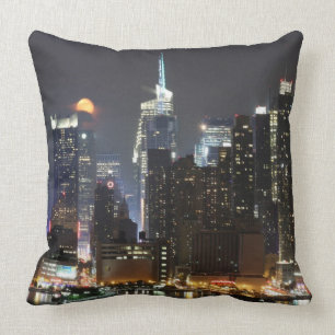 Moon rises over midtown New York. Throw Pillow