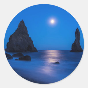 Moonrise reflection on ocean and sea stacks classic round sticker