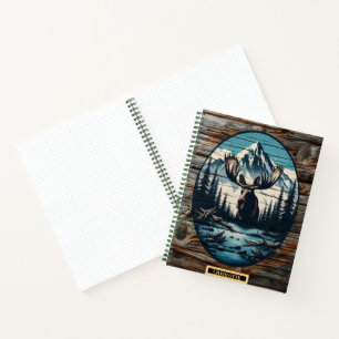 Moose by tranquil mountain lake notebook