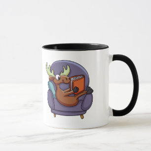 Moose reading a book on a sofa   choose back colou mug