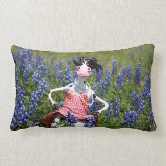 Mootilda the cow roams in the bluebonnets. lumbar pillow