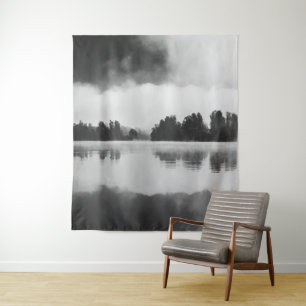 Morning fog above the lake in black and white tapestry