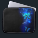 Morpho Butterfly in the Dark Background Laptop Sleeve<br><div class="desc">blue,  glowing butterflies morpho on a dark background. Morpho. Design with butterflies.</div>