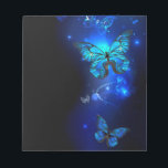 Morpho Butterfly in the Dark Background Notepad<br><div class="desc">blue,  glowing butterflies morpho on a dark background. Morpho. Design with butterflies.</div>