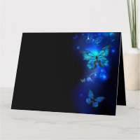 Morpho Butterfly in the Dark Background