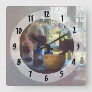 Mortar, Pestle and Bottles by Window Square Wall Clock