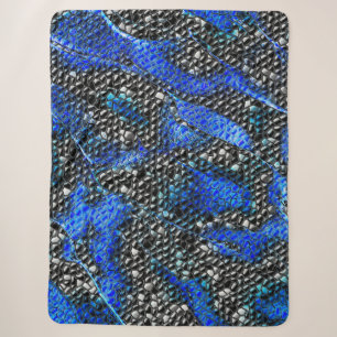 Mosaic of small convex in blue to grey and black sherpa blanket