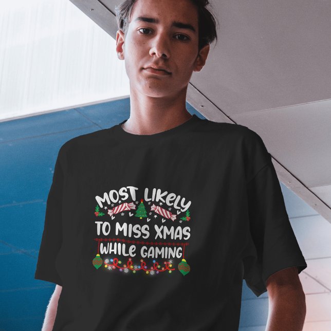 Most Likely to Miss Xmas While Gaming funny T-Shirt (Creator Uploaded)