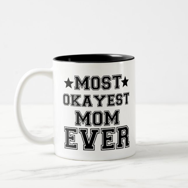 MOST OKAYEST MOM EVER Two-Tone COFFEE MUG (Left)