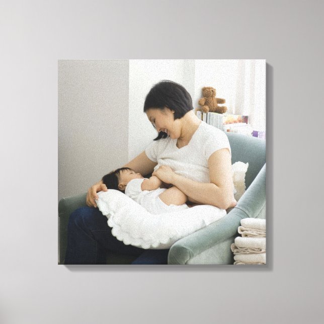 Mother breast feeding baby girl canvas print (Front)