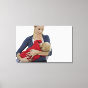 Mother breastfeeding her baby. canvas print
