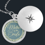Mother of the Bride with Blue and Cream Leaves Locket Necklace<br><div class="desc">This beautiful locket is a special accessory designed for the Mother of the Bride. The locket features a classic blue and cream colour scheme with a cream-coloured leaf pattern inside, adding a touch of elegance and natural beauty. The hidden message inside is a special touch that will make this locket...</div>