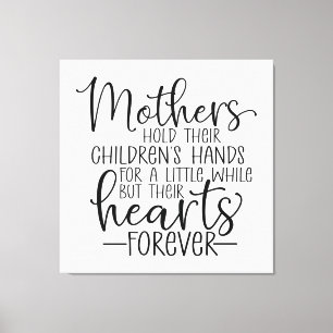 Mothers hold their children’s hand for a little  canvas print
