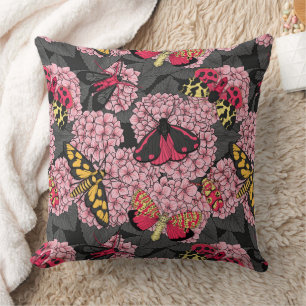 Moths on pink hydrangea throw pillow