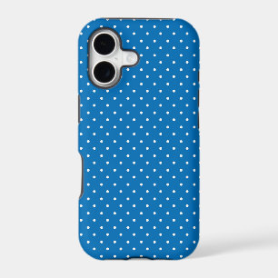 Motif à pois sur fond bleu uni 
