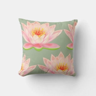 Motif de fleur rose sur un coussin décoratif vert 