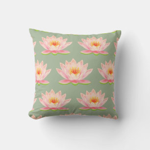 Motif de fleur rose sur un coussin décoratif vert 