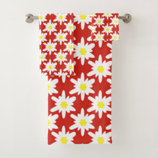 Motif de fleurs d'edelweiss blanches sur fond roug