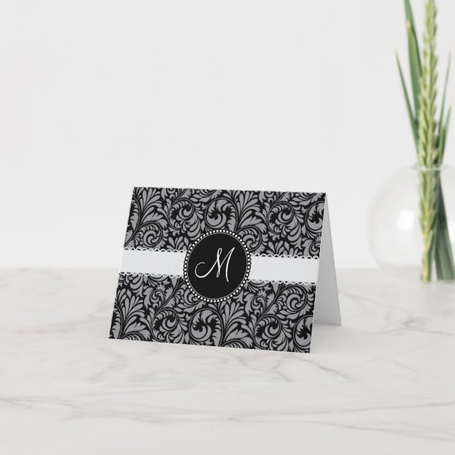Motif floral de damassé grise noire initiale de (Devant)