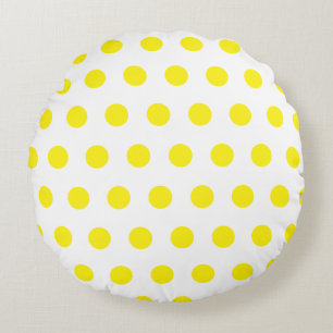 Motif pois jaune sur coussin rond blanc