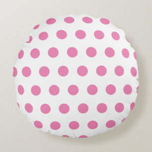 Motif pois rose sur coussin rond blanc