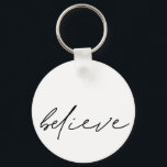 Motivational Believe Handwritten Black Script Keychain<br><div class="desc">Motivational Believe Handwritten Script Typography  A single inspiring word to carry with you. This minimalist design has Believe in an informal handwriting style on white. The text can be changed to a different colour if you wish.</div>