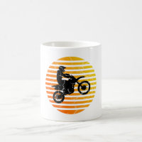 Motocross Dirt Bike Catching Air at Sunrise Sunset