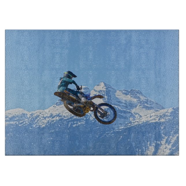 Motocross Rider Flying over Mountain Cutting Board (Front)