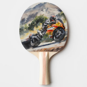 Motorbike cornering up a mountainside ping pong paddle