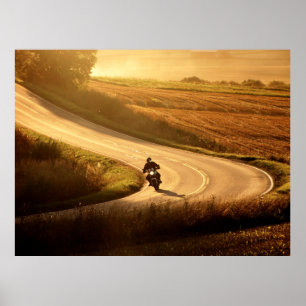 Motorcycle on countryside road at autumn evening. poster
