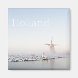 Moulin à vent dans la neige en hiver aimant texte
