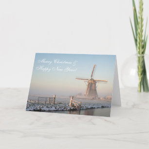 Moulin à vin de carte de Noël en hiver au soleil