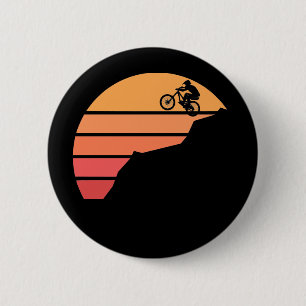 Mountain biking in the susnset 2 inch round button