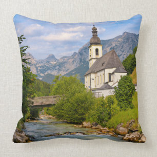 Mountain church with stream landscape throw pillow