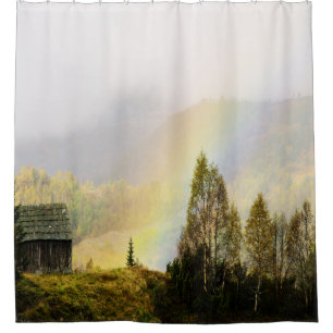 Mountain shed with rainbow