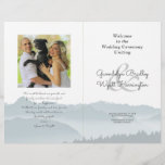 Mountains Folded Wedding Photo Program Template<br><div class="desc">Misty mountains folded wedding program template with a photo area. Blue-grey mountain scenery covers the bottom third of the paper on all the pages. Customize text on front and back of 8.5 x 11 inch paper that will be folded in half after purchase. The photo of the couple will appear...</div>